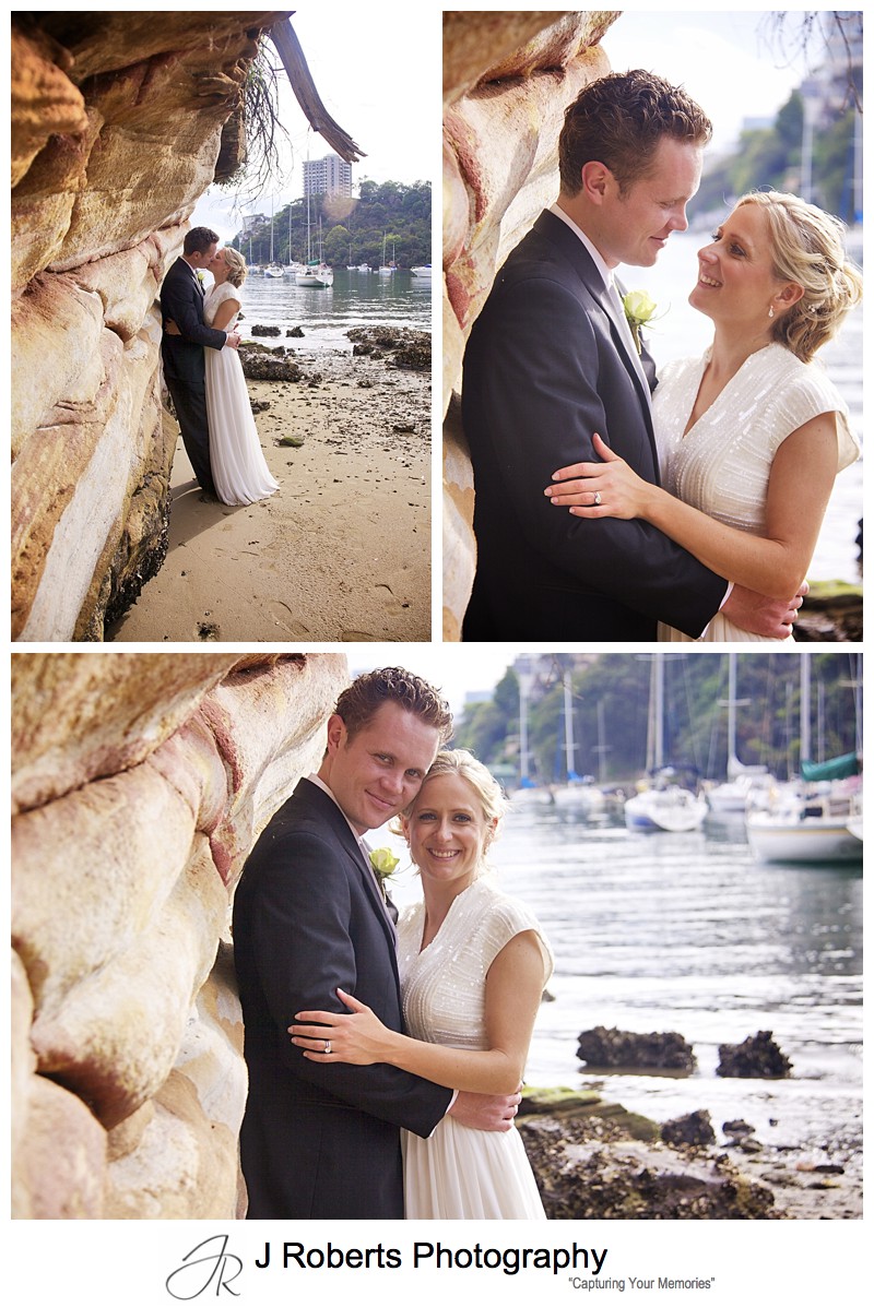 Couple embracing near sandstone rock face - wedding photography sydney